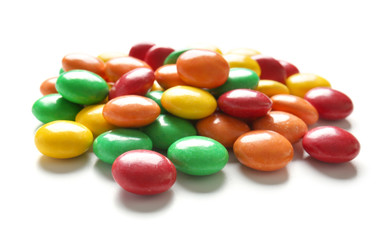 Delicious candies on white background