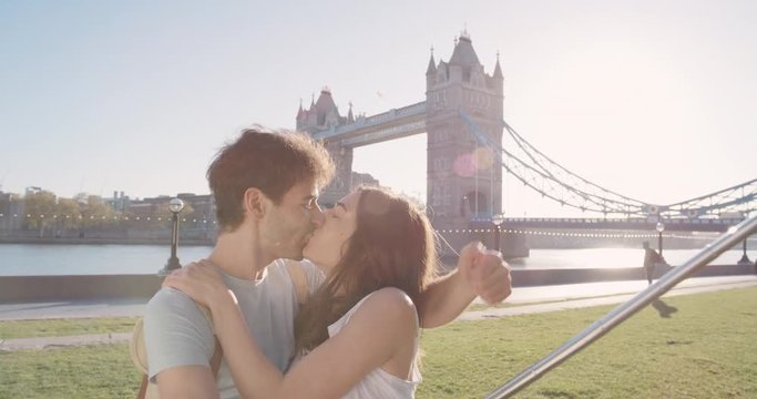 Tourist couple taking selfie smartphone in city sharing lifestyle photo enjoying  holiday European   vacation travel adventure London