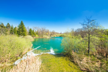 Beautiful landscape, waterfall, clear green water and on Mreznica river in Croatia. Beautiful world. Panoramic view. 