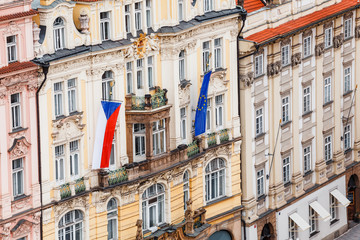 Fototapeta na wymiar Flags of czech republic and euro union on facade of the house