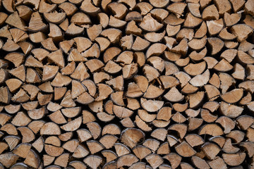 Pile of chopped fire wood prepared for winter