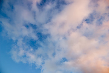 Blue sky with white fluffy clouds