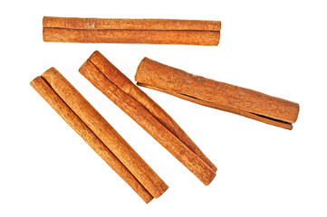 Cinnamon sticks isolated on white background, top view