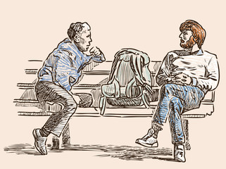 Fototapeta na wymiar Citizens talk on a street bench