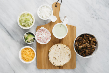 Carnitas Tacos with Cilantro Cream Sauce