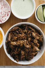 Carnitas Tacos with Cilantro Cream Sauce