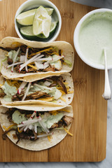 Carnitas Tacos with Cilantro Cream Sauce
