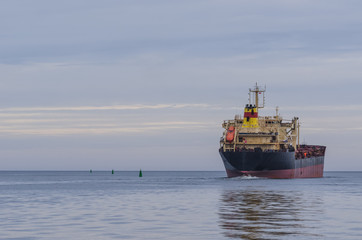 MERCHANT VESSEL - The bulk carrier is on a calm sea