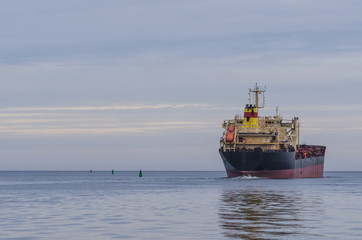 Fototapeta premium MERCHANT VESSEL - The bulk carrier is on a calm sea