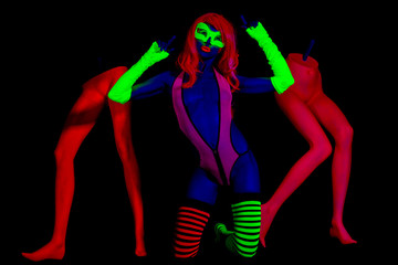 Fototapeta na wymiar glow uv neon sexy disco female cyber doll