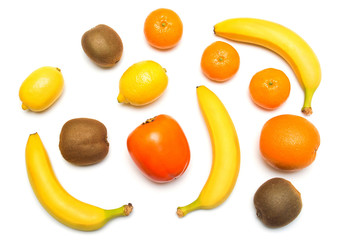 Fruit collection of banana, kiwi, mandarin, orange, persimmons and lemon isolated on white background. Flat lay, top view