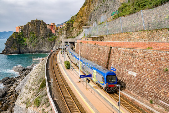 Manarola, Italy - may 12, 2016: train station with unidentified people in Manarola. Manarola is one of the 5 picturesque villages of the Cinqueterre, they are listed under UNESCO world heritage sites