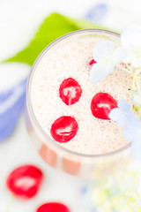Refreshing summer drink fruit cocktail cherries