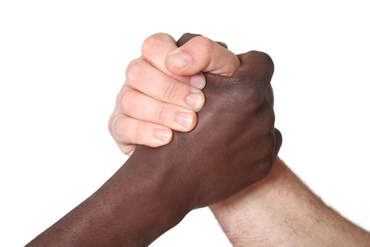 racism concept, black and white hands, Handshake of friendship