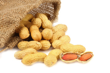 peanuts with sack cloth isolated on the white background