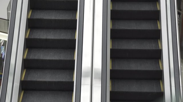 moving escalator up and down, mecanic, electic, Stair and escalators in a public area