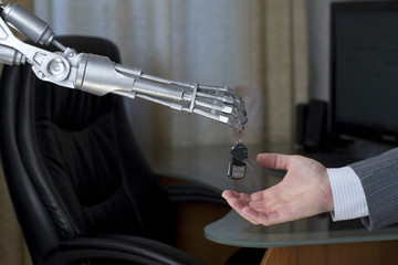 Robot gives a man a car key