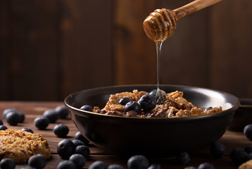 muesli with honey and blueberry © peterzsuzsa