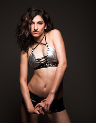 Fototapeta premium young woman on black background