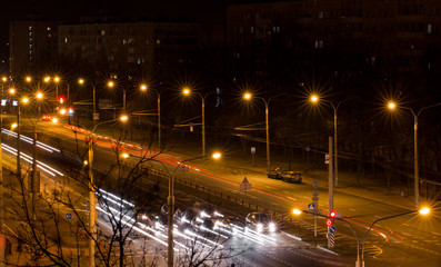 Fototapeta premium night city, traces from headlights of cars.