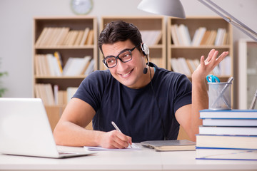 Young freelance worked working on computer