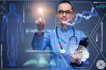 Doctor in futuristic medical concept pressing button