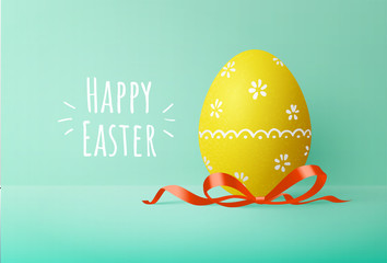 easter egg with red bow