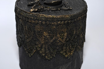 Closeup of vintage style round jewelry box