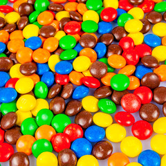 Fototapeta na wymiar colorful candies. Colorful chocolate candy for backgrounds
