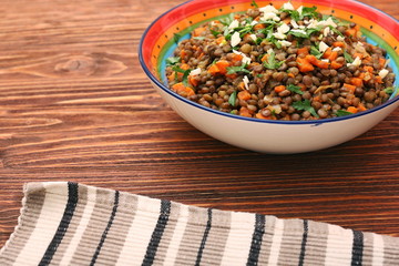 Lentil with carrot and onion in bowl