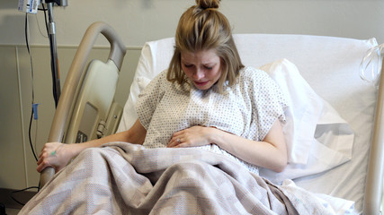 pregnant woman having contractions in the hospital