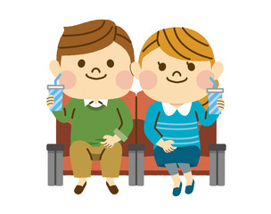 映画を観る男女