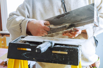 Repair broken walls with plaster putty.