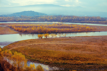 A winding river in the valley. Panoramic view from the mountain. Georgia, Europe