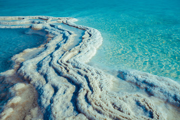 Fototapeta na wymiar Texture of Dead sea. Salt sea shore