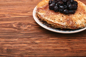 Delicious pancakes with cherry jam