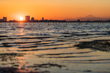 Nice view of Tokyo sunset , Tokyo bay at Funabashi area and Mt. Fuji in winter season