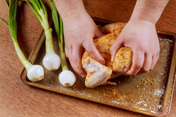 chef marinated raw chicken in bowl