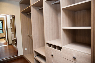 Modern apartment interior with empty wardrobe.