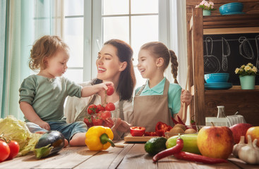 Happy family in the kitchen.