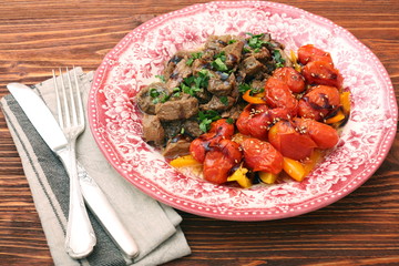 beef stew with peppers and cherry tomatoes