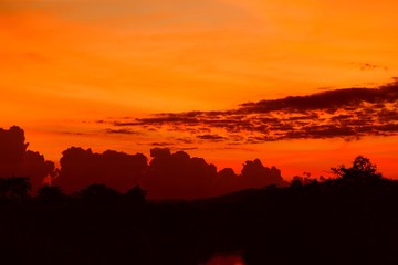 sunset beautiful colorful landscape and silhouette tree mountain in sky twilight time