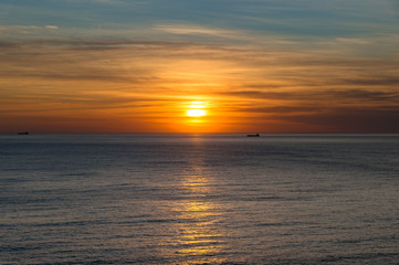 Bright sunrise, sunset landscape with ocean