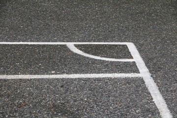 Fototapeta premium Football field corner asphalt wet