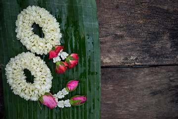 garland on banana leaf for worship about various festival in thailand