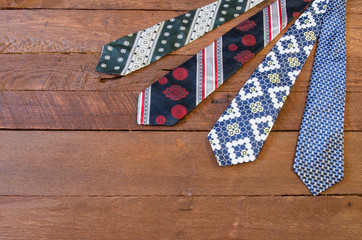 Fun Father's Day background of colorful vintage ties with copy space