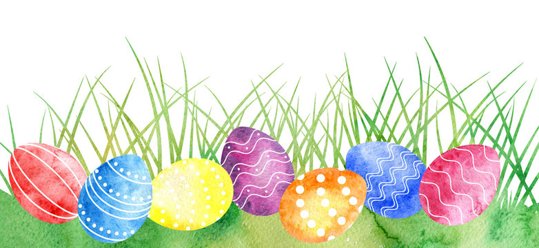 Watercolor Easter eggs at green grass