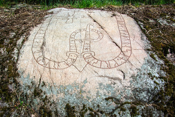 Runes carved into  a rock