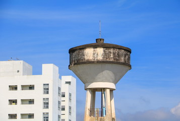 old Water tank for agriculture with blue sky background