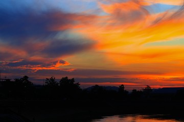 Fototapeta premium sunset beautiful colorful landscape and silhouette tree in sky twilight time